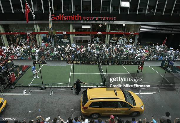 Nike and Golfsmith sponsor an exhibition tennis match between Roger Federer and Rafael Nadal outside the Golfsmith Store on 54th Street in NY, NY on...