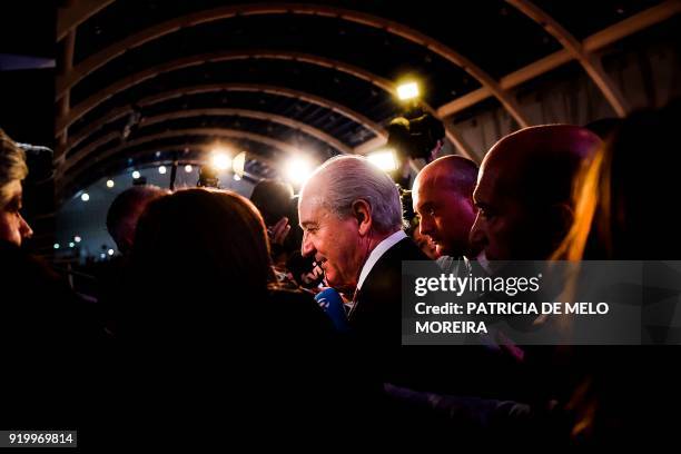 Newly elected president of the Social Democratic Party Rui Rio leaves surrounded by journalists after his closing speech at the 37th PSD Congress in...