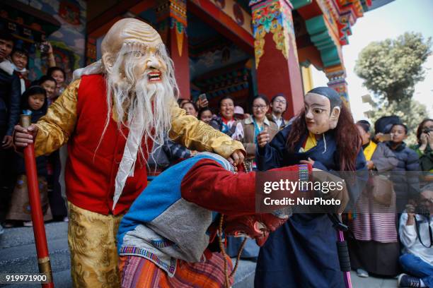 People from Sherpa community dressed in traditional attires perform mask dance to celebrate the Lunar New Year, the year of Dog at the Monastery in...