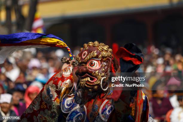 People from Sherpa community dressed in traditional attires perform mask dance to celebrate the Lunar New Year, the year of Dog at the Monastery in...
