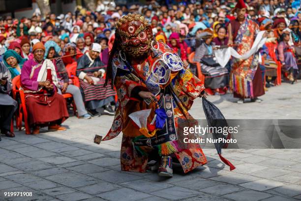 People from Sherpa community dressed in traditional attires perform mask dance to celebrate the Lunar New Year, the year of Dog at the Monastery in...