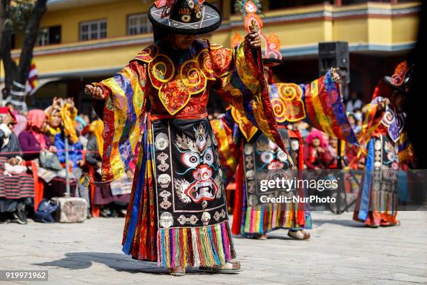 People from Sherpa community dressed in traditional attires perform to celebrate the Lunar New Year, the year of Dog at the Monastery in Kathmandu,...