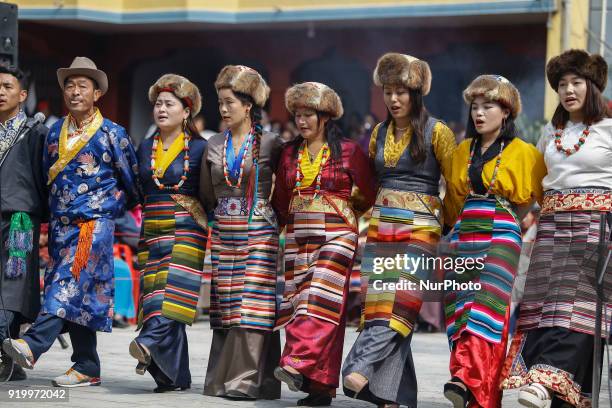 People from Sherpa community dressed in traditional attires perform to celebrate the Lunar New Year, the year of Dog at the Monastery in Kathmandu,...