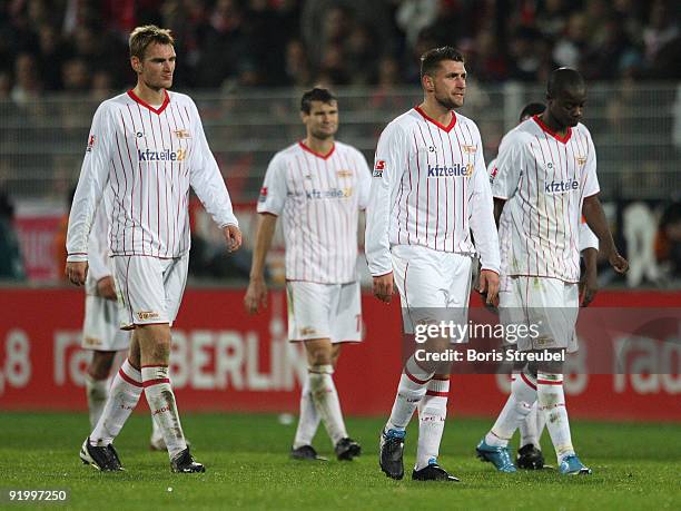 Christian Stuff of Berlin shows his frustration with his team mates Torsten Mattuschka and John Jairo Mosquera after loosing the Second Bundesliga...