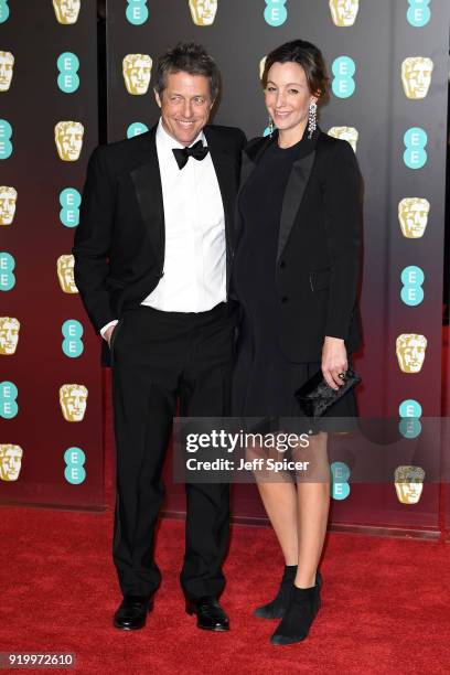 Hugh Grant and Anna Eberstein attend the EE British Academy Film Awards held at Royal Albert Hall on February 18, 2018 in London, England.