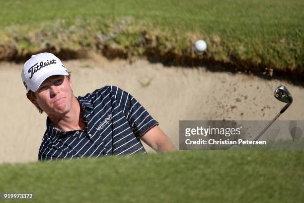Derek Fathauer plays his shot from the bunker on the first hole during the final round of the Genesis Open at Riviera Country Club on February 18,...