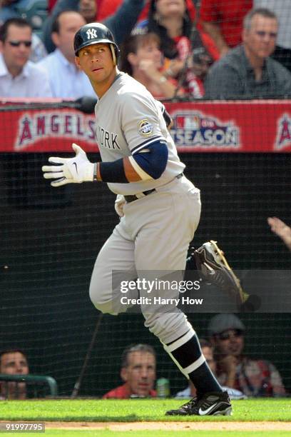 Alex Rodriguez of the New York Yankees rounds the bases after hitting a home run during the forth inning off Jered Weaver of the Los Angeles Angels...