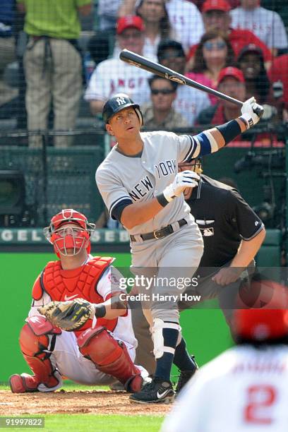 Alex Rodriguez of the New York Yankees hits a home run during the forth inning off Jered Weaver of the Los Angeles Angels of Anaheim in Game Three of...