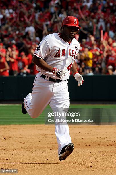 Howie Kendrick of the Los Angeles Angels of Anaheim rounds the bases after hitting a home run off Andy Pettitte of the New York Yankees during the...