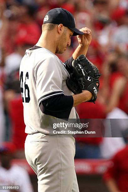 Andy Pettitte of the New York Yankees reacts after Vladimir Guerrero of the Los Angeles Angels of Anaheim hit a two run home run during the sixth...