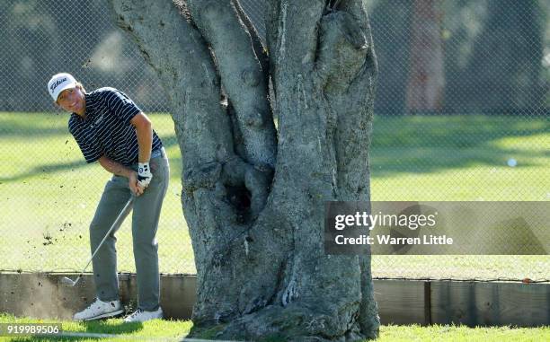 Derek Fathauer plays his shot on the second hole during the final round of the Genesis Open at Riviera Country Club on February 18, 2018 in Pacific...