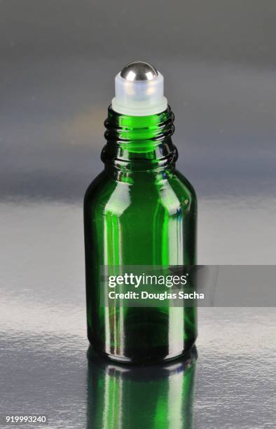 roll-on applicator on an essential oil health bottle - roll on bildbanksfoton och bilder