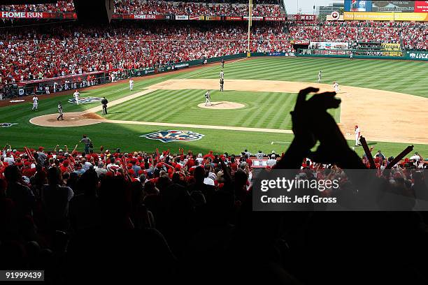 Fans react after Howie Kendrick of the Los Angeles Angels of Anaheim hits a home run off Andy Pettitte of the New York Yankees during the fifth...