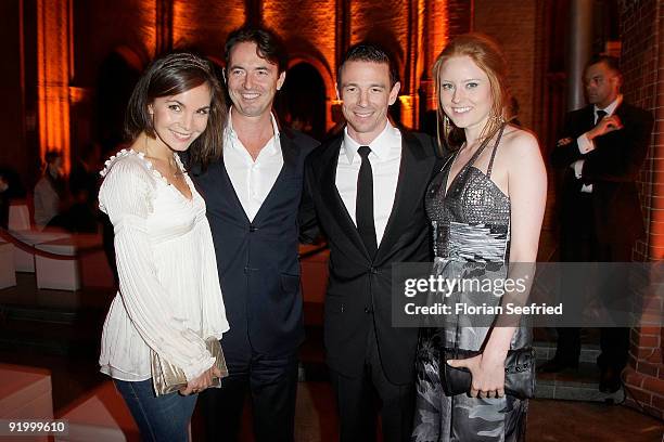 Actress Nadine Warmuth and Martin Bachmann and producer Oliver Berben and model Barbara Meier attend the World premiere of 'Pope Joan' at the Sony...