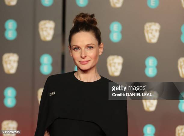Swedish actress Rebecca Ferguson poses on the red carpet upon arrival at the BAFTA British Academy Film Awards at the Royal Albert Hall in London on...