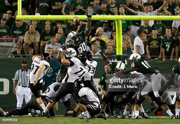 Defensive end Jason Pierre-Paul of the South Florida Bulls attempts to block a field goal against the Cincinnati Bearcats during the game at Raymond...