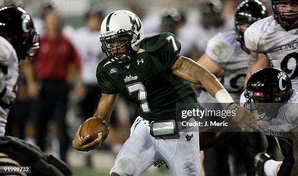 Quarterback B.J. Daniels of the South Florida Bulls runs the ball against the Cincinnati Bearcats during the game at Raymond James Stadium on October...