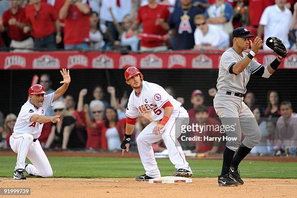 Jeff Mathis of the Los Angeles Angels of Anaheim holds at second base after hitting a double off Phil Hughes of the New York Yankees during the...