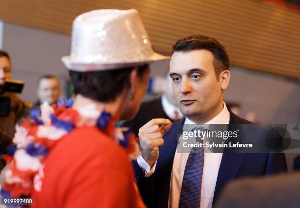 Florian Philippot, leader of far-right movement "Les Patriotes" speaks to an attendee during their first congress on February 18, 2018 in Arras,...