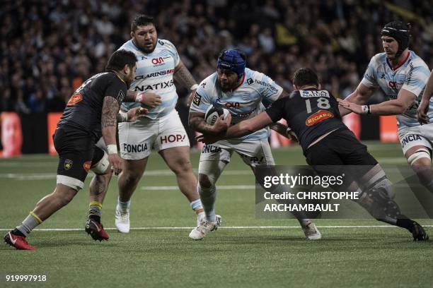 Racing 92's Samoan hooker Ole Avei runs with the ball during the French Top 14 rugby union match between Racing 92 and La Rochelle at the U-Arena...