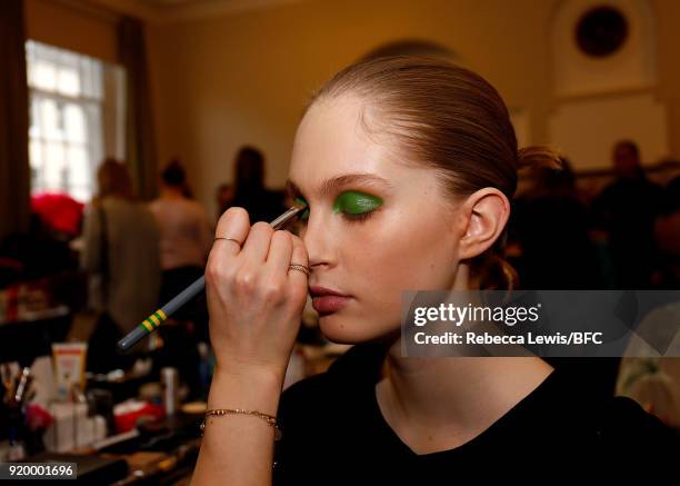 Model backstage ahead of the palmer//harding show during London Fashion Week February 2018 at on February 18, 2018 in London, England.