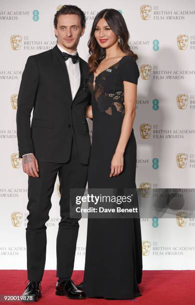 Sergei Polunin and Gemma Chan poses in the press room during the EE British Academy Film Awards held at Royal Albert Hall on February 18, 2018 in...