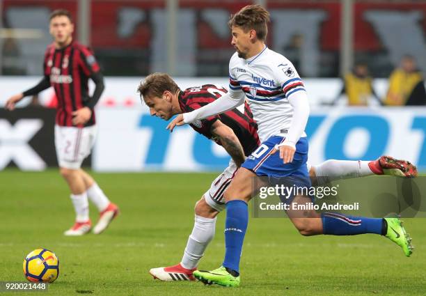 Lucas Biglia of AC Milan competes for the ball with Gaston Ramirez of UC Sampdoria during the serie A match between AC Milan and UC Sampdoria at...