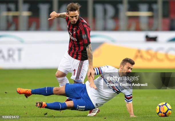 Lucas Biglia of AC Milan competes for the ball with Karol Linetty of UC Sampdoria during the serie A match between AC Milan and UC Sampdoria at...