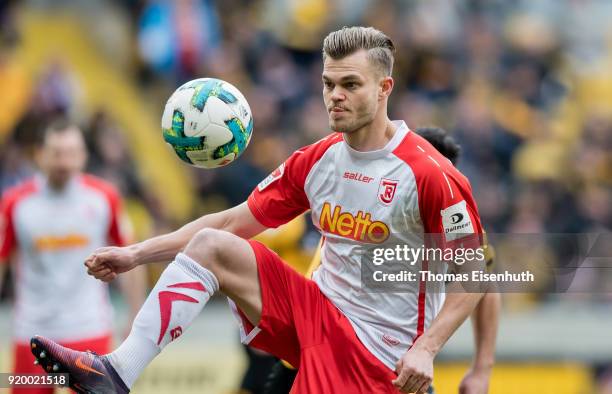 Benedikt Saller of Regensburg plays the ball during the Second Bundesliga match between SG Dynamo Dresden and SSV Jahn Regensburg at DDV-Stadion on...