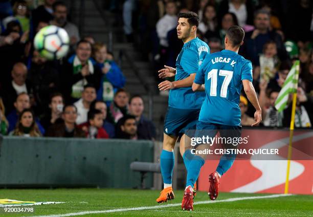 Real Madrid's Spanish midfielder Marco Asensio celebrates after scoring a goal during the Spanish league football match Real Betis vs Real Madrid at...