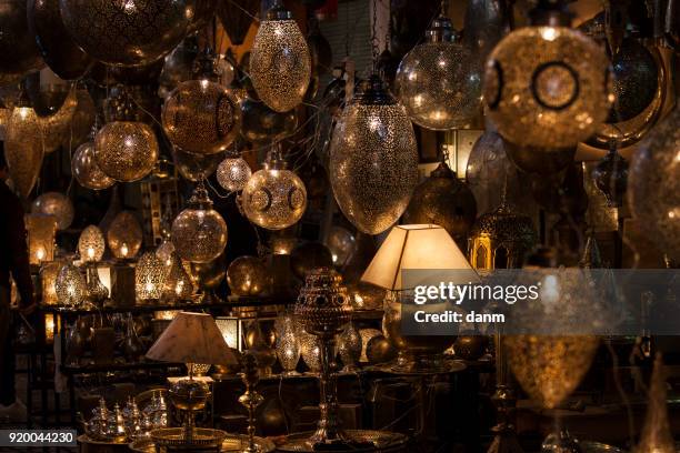 lamps in a store in marrakesh morocco - lampion imagens e fotografias de stock