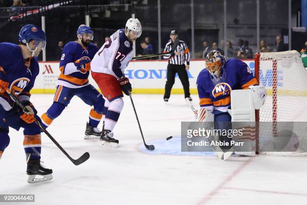 Josh Anderson of the Columbus Blue Jackets takes a shot against Jaroslav Halak of the New York Islanders in the first period during their game at...
