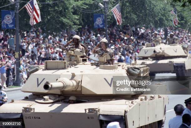 Abraham tanks parade down Constitution avenue in a victory parade in the nation's capital to honor troops that served in the Gulf War. The parade was...