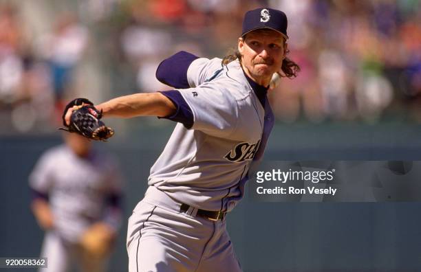 Randy Johnson of the Seattle Mariners pitches during an MLB game against the Oakland Athletics at he Oakland-Alameda County Colosseum during the 1993...