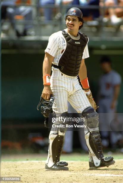 Benito Santiago of the San Diego Padres catches during an MLB game at Jack Murphy Stadium in San Diego, California during the 1988 season.