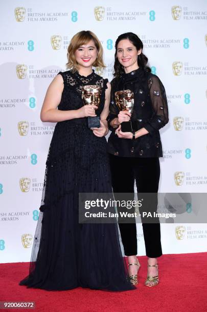 Ser En Low and Paloma Baeza with the BAFTA for British Short Animation in the press room at the EE British Academy Film Awards held at the Royal...