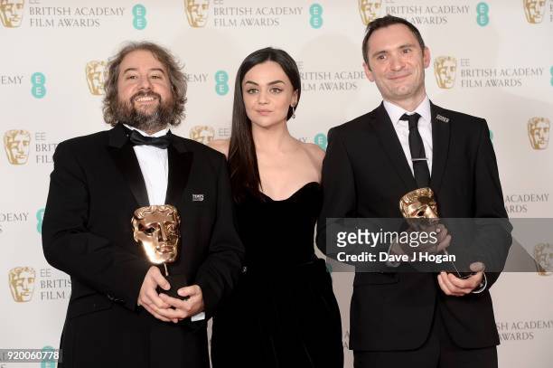 Winners of the Editing Award for 'Baby Driver', Jonathan Amos, presenter Hayley Squires and Paul Machliss pose in the press room during the EE...