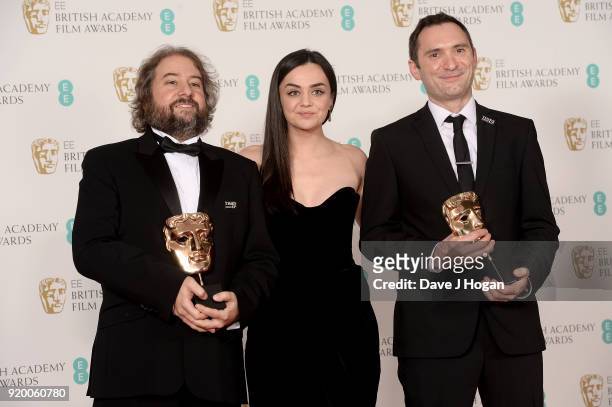 Winners of the Editing Award for 'Baby Driver', Jonathan Amos, presenter Hayley Squires and Paul Machliss pose in the press room during the EE...