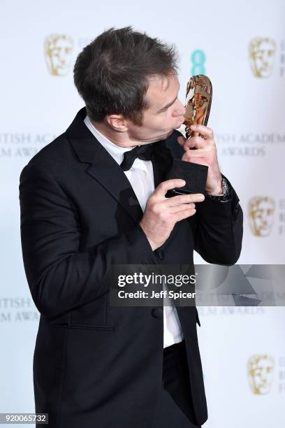 Sam Rockwell, winner of the Best Supporting Actor award for the movie "Three Billboards Outside Ebbing, Missouri" poses in the press room during the...