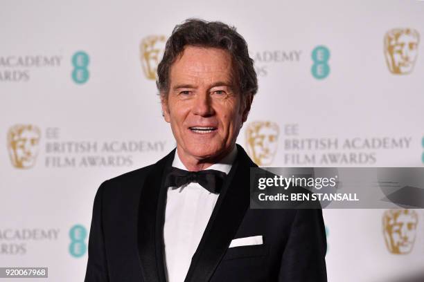 Citation reader US actor Bryan Cranston poses in the press room after presenting an award at the BAFTA British Academy Film Awards at the Royal...