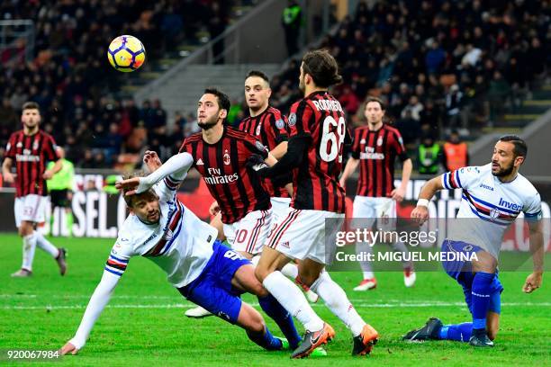 Milan's German midfielder Hakan Calhanoglu vies with Sampdoria's Uruguayan midfielder Gaston Ramirez during the Italian Serie A football match...