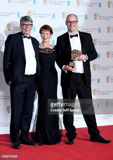Celia Imrie poses with Nik Powell and Jon Wardle, accepting the Outstanding British Contribution To Cinema award on behalf of the National Film and...