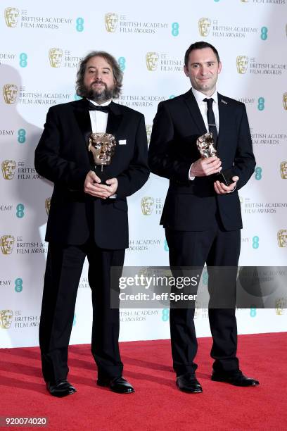 Paul Machliss and Jonathan Amos, winners of the Best Editing award for the movie 'Baby Driver' pose in the press room during the EE British Academy...