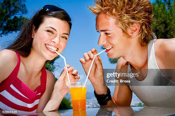 juicy attraction - straw lips stock pictures, royalty-free photos & images