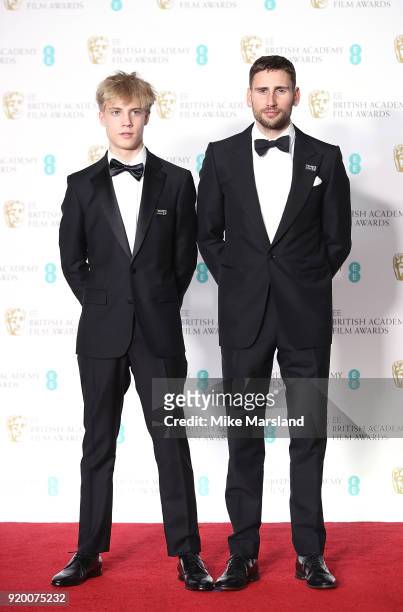 Tom Taylor and Edward Holcroft in the press room during the EE British Academy Film Awards held at Royal Albert Hall on February 18, 2018 in London,...