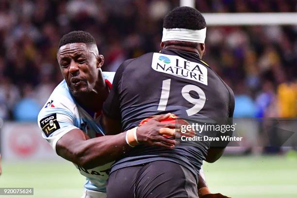 Yannick Nyanga of Racing 92 tackles Levani Botia of La Rochelle during the French Top 14 match between Racing 92 and La Rochelle at U Arena on...