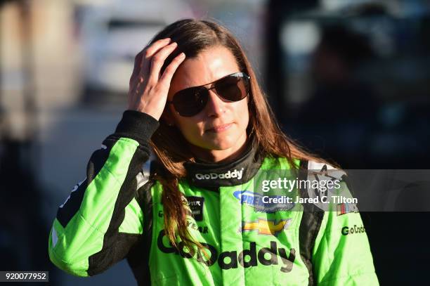 Danica Patrick, driver of the GoDaddy Chevrolet, walks from the infield care center after being involved in an on-track incident the Monster Energy...