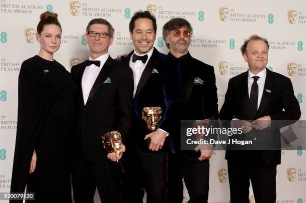 Rebecca Ferguson and Toby Jones with Jeffrey A. Melvin, Paul D. Austerberry and Shane Vieau, winners of the Production Design award for 'The Shape Of...