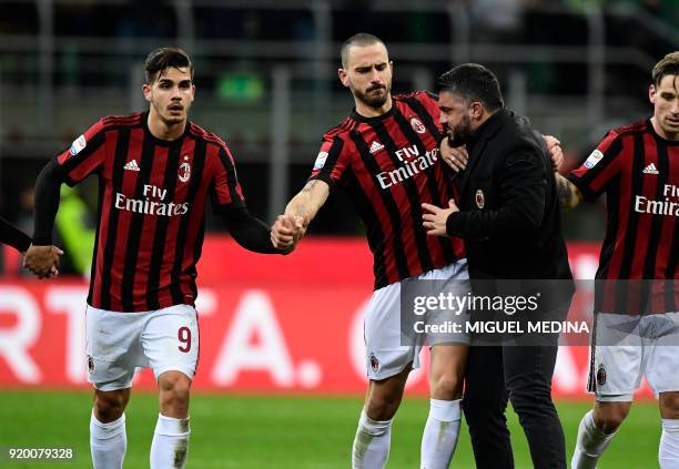 Milan's coach from Italy Gennaro Gattuso celebrate with AC Milan's Captain Italian defender Leonardo Bonucci and AC Milan's Portuguese forward Andre...