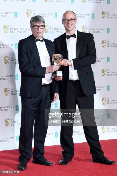 Nik Powell and Jon Wardle, accepting the Outstanding British Contribution To Cinema award on behalf of the National Film and Television School, pose...